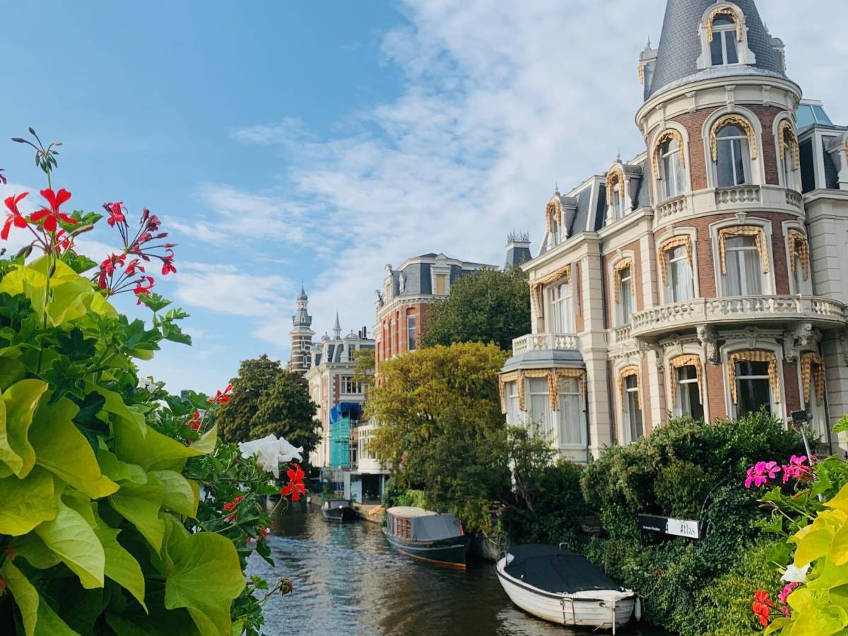 Flowers in front of a canal in Amsterdam.