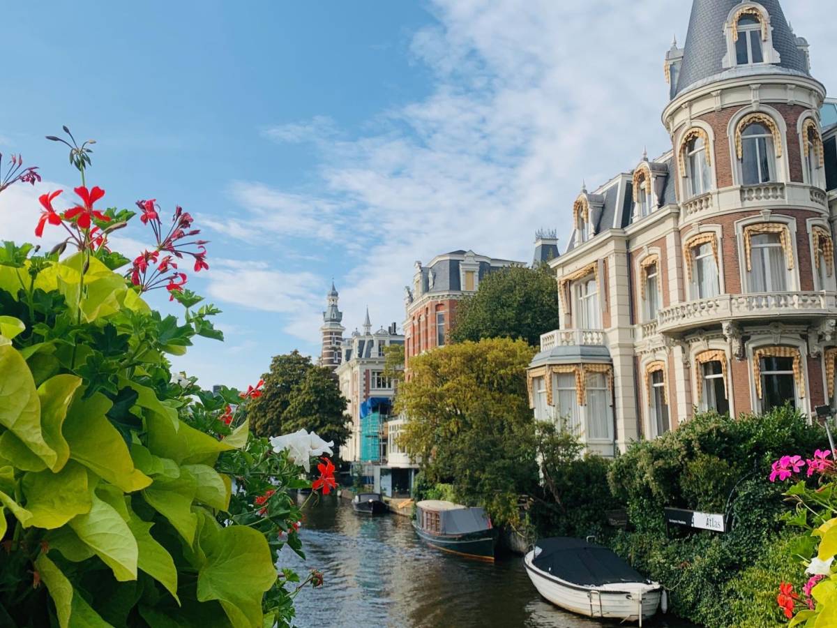 Flowers in front of a canal in Amsterdam.