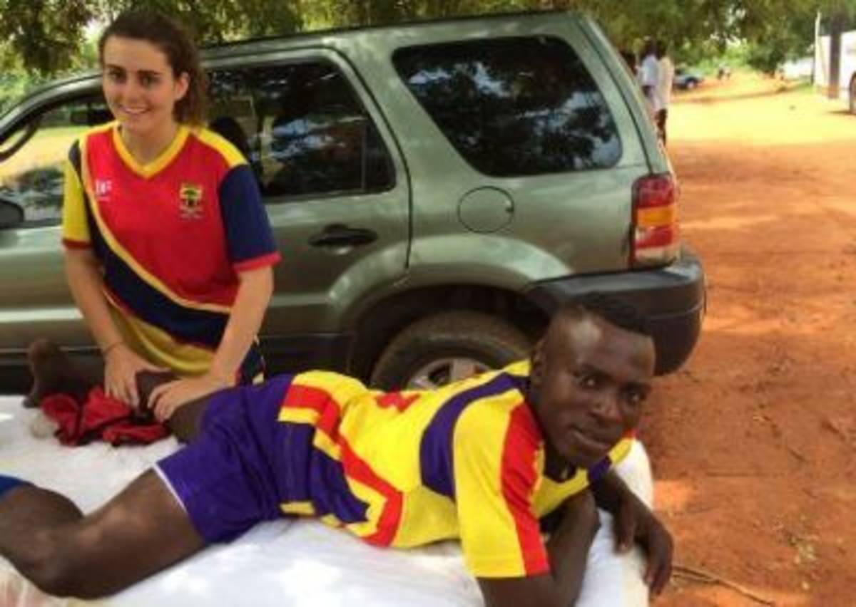 Intern giving an athlete a massage