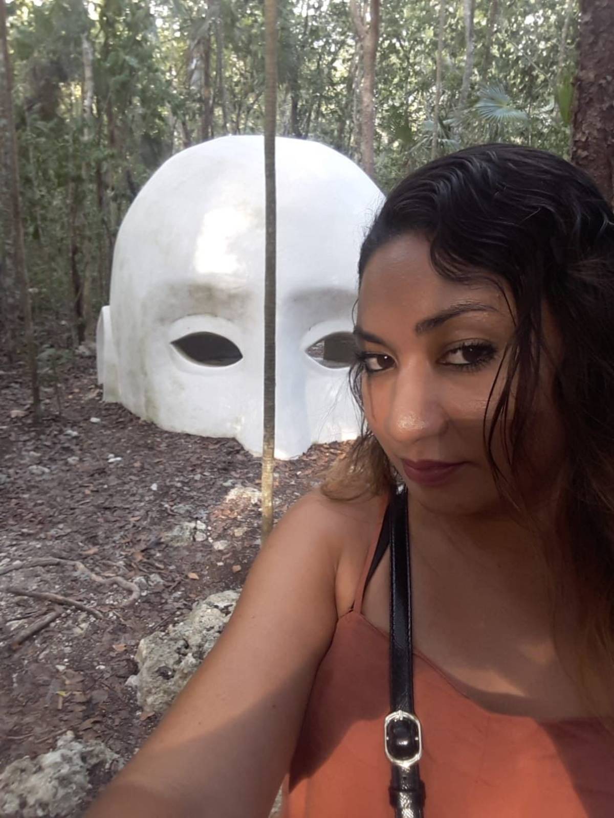 Giant mask with a female doing a selfie