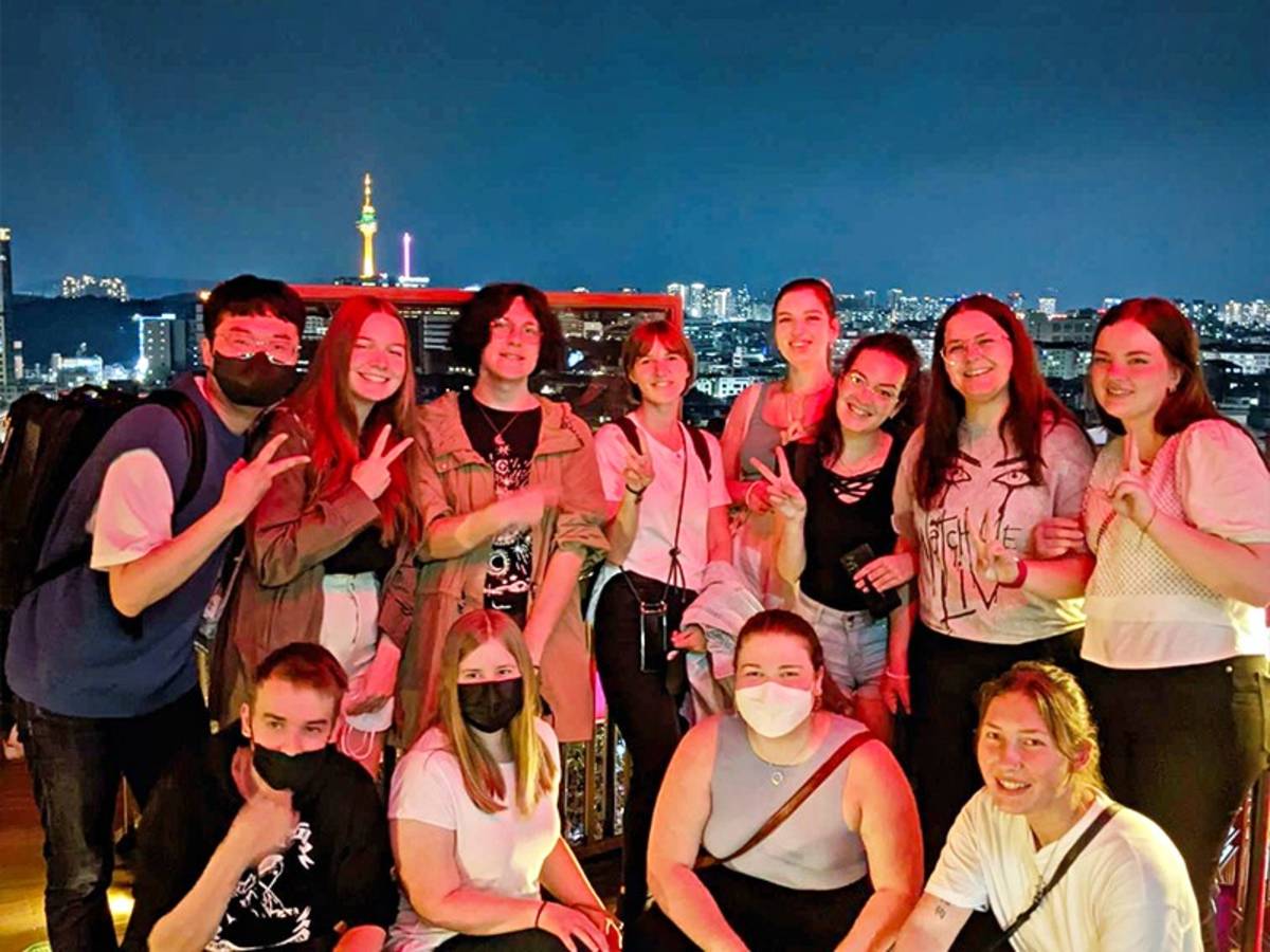 Group of people with city views in the background