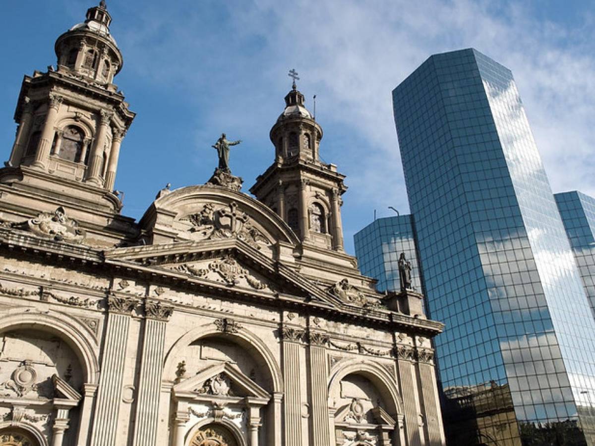 historic and modern buildings beside each other downtown Santiago