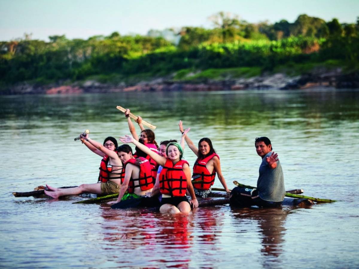 home-made raft going down river