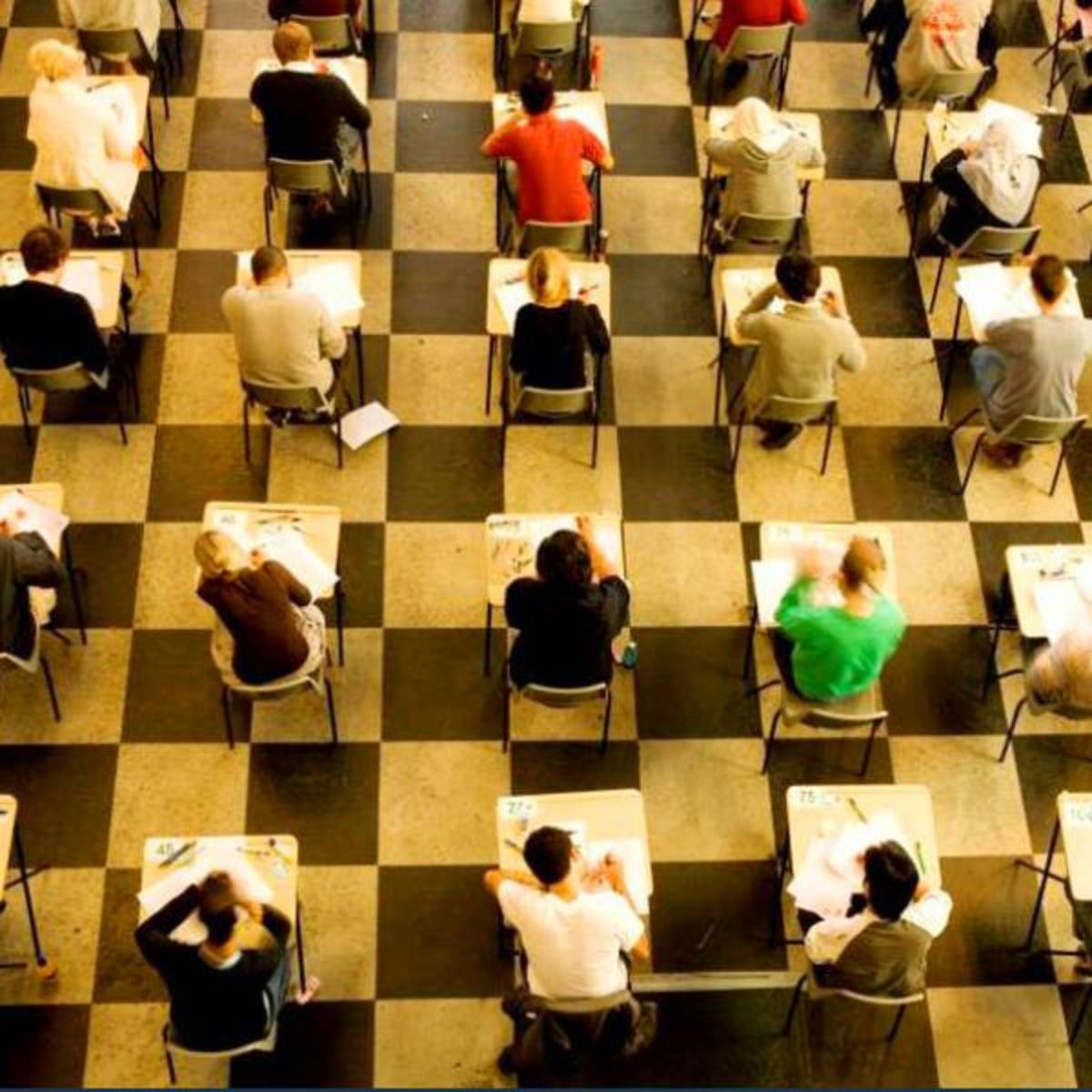 Students writing at their desks, Trinity University