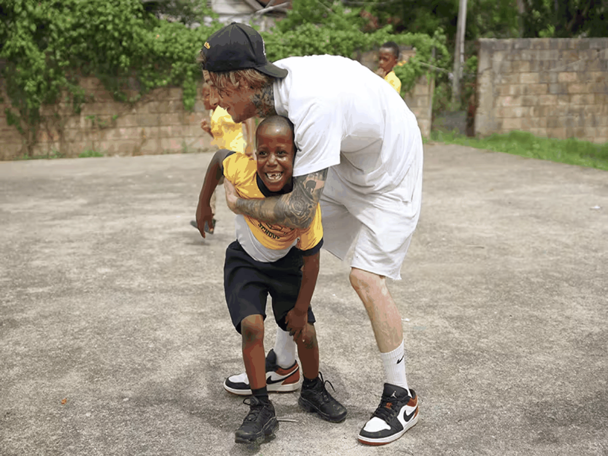 IVHQ Volunteer playing games with Local Children in Jamaica 