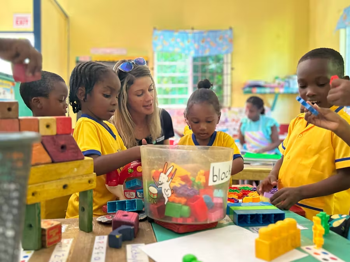 IVHQ Volunteers Building Blocks with Children in St Mary Jamaica