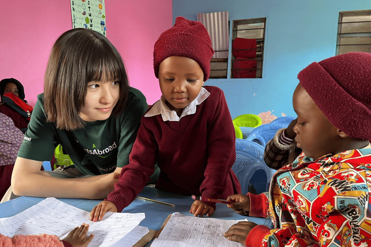 Japanese participant works with local children in our Maasai school