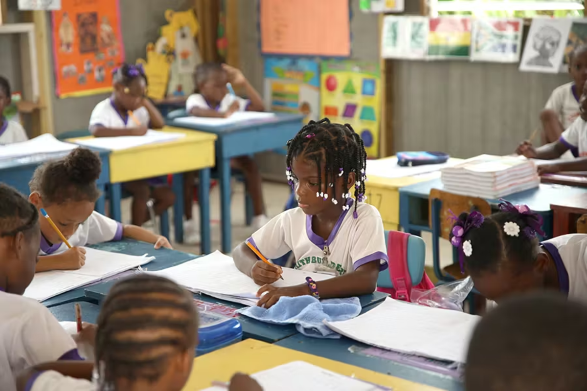 Local Child Learning English in the IVHQ School Support Program