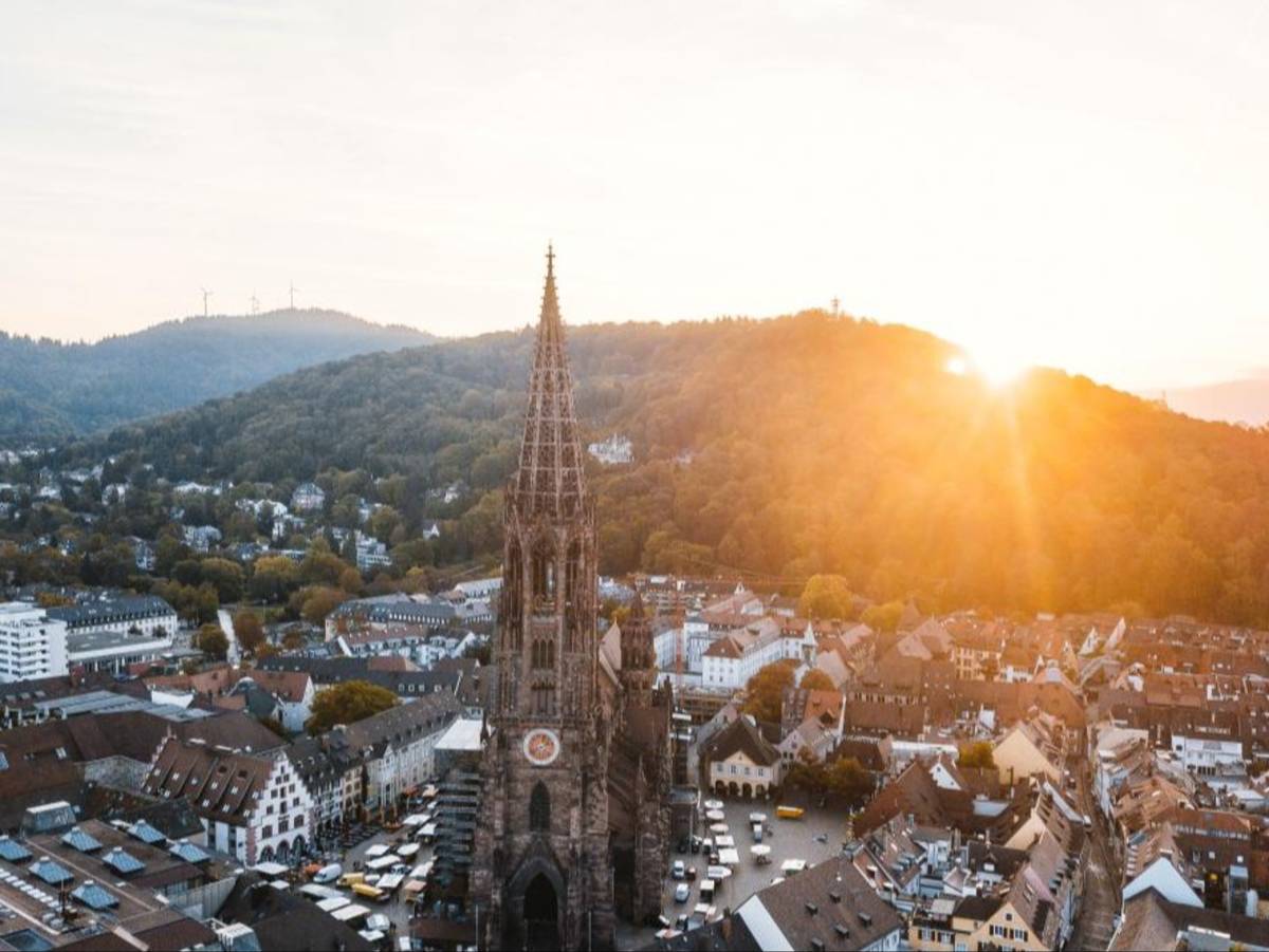 Looking out over the cathedral of Freiburg, Germany at dusk.