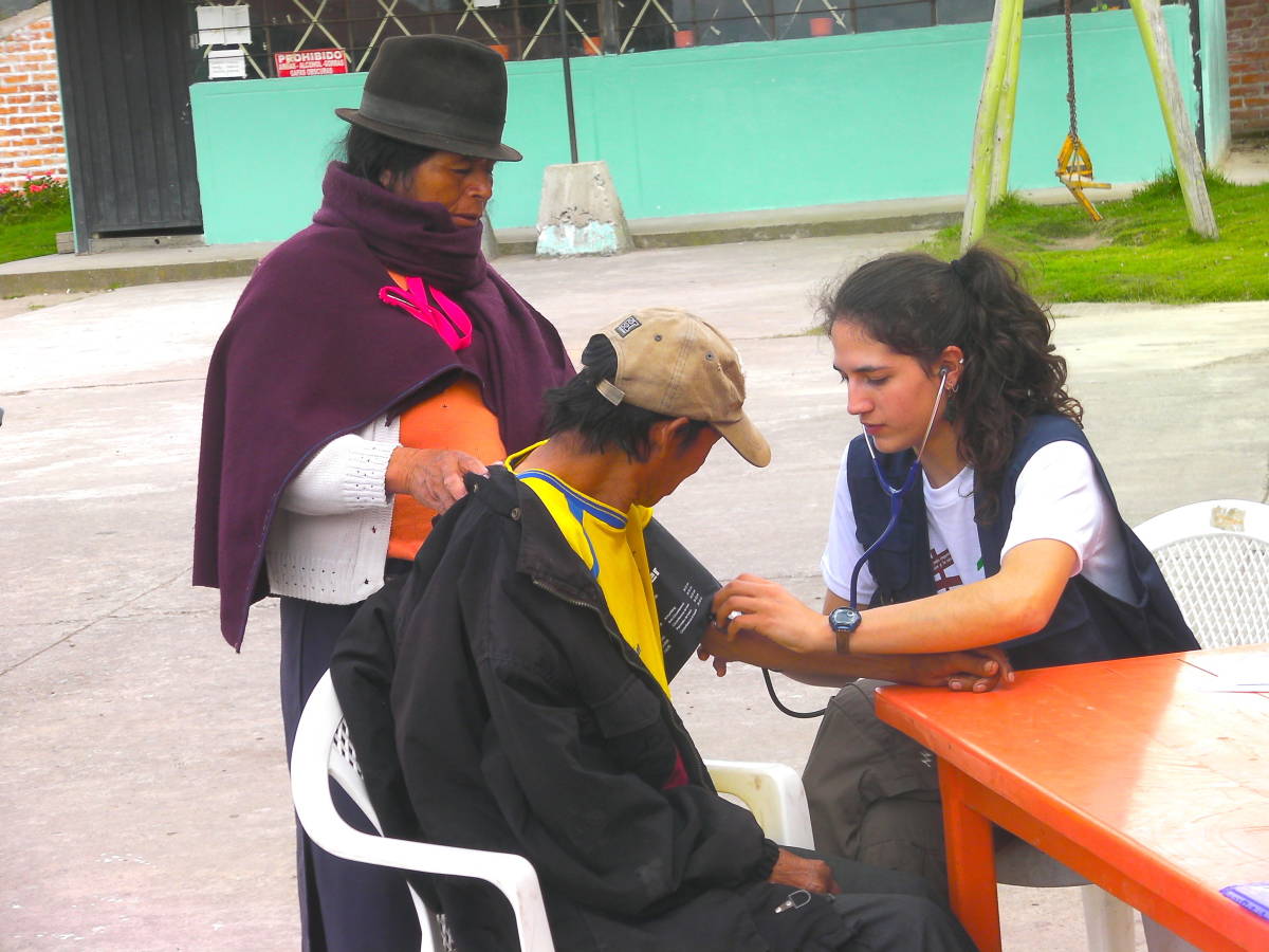 volunteer taking blood pressure