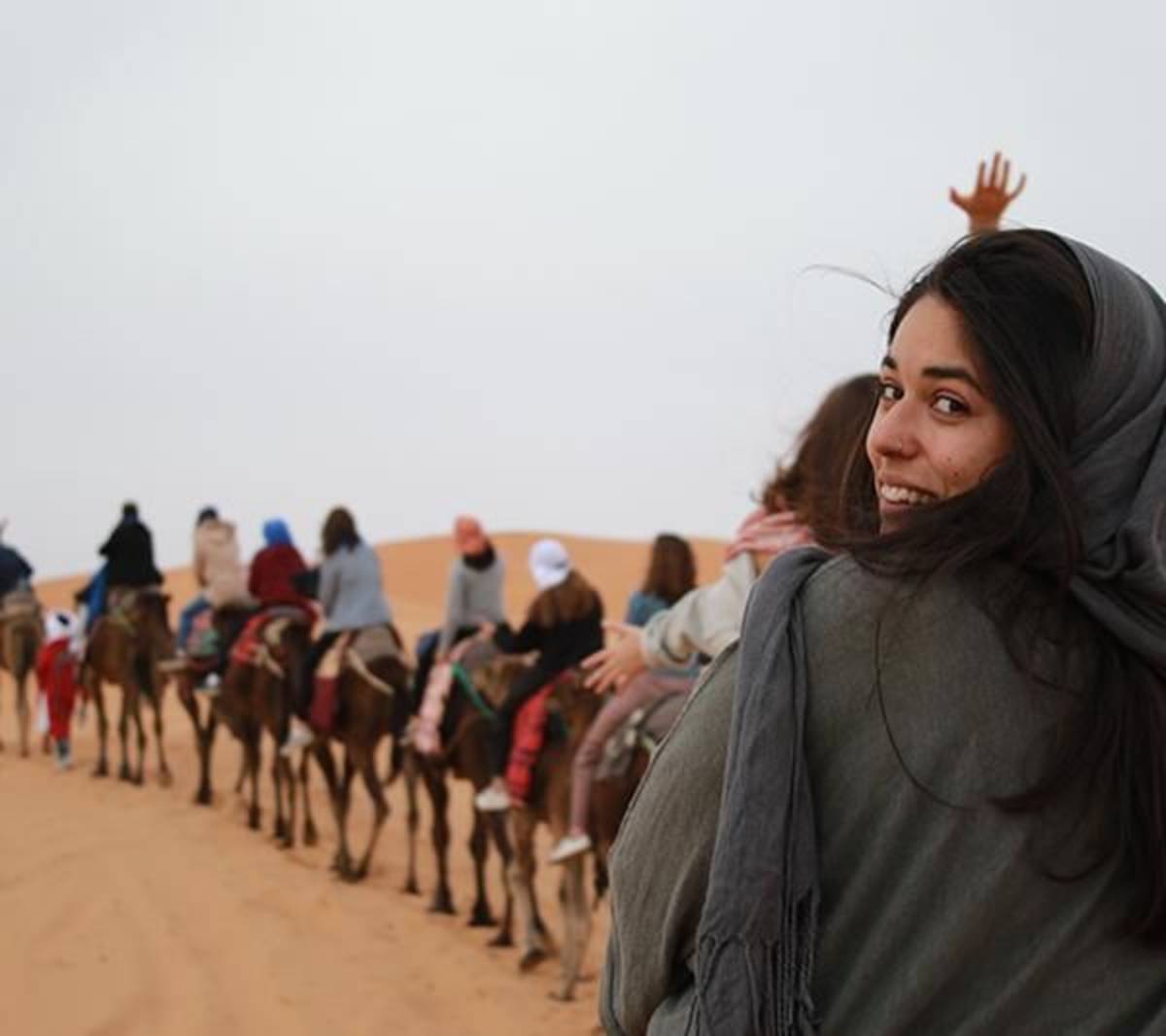 Students on Camels in desert