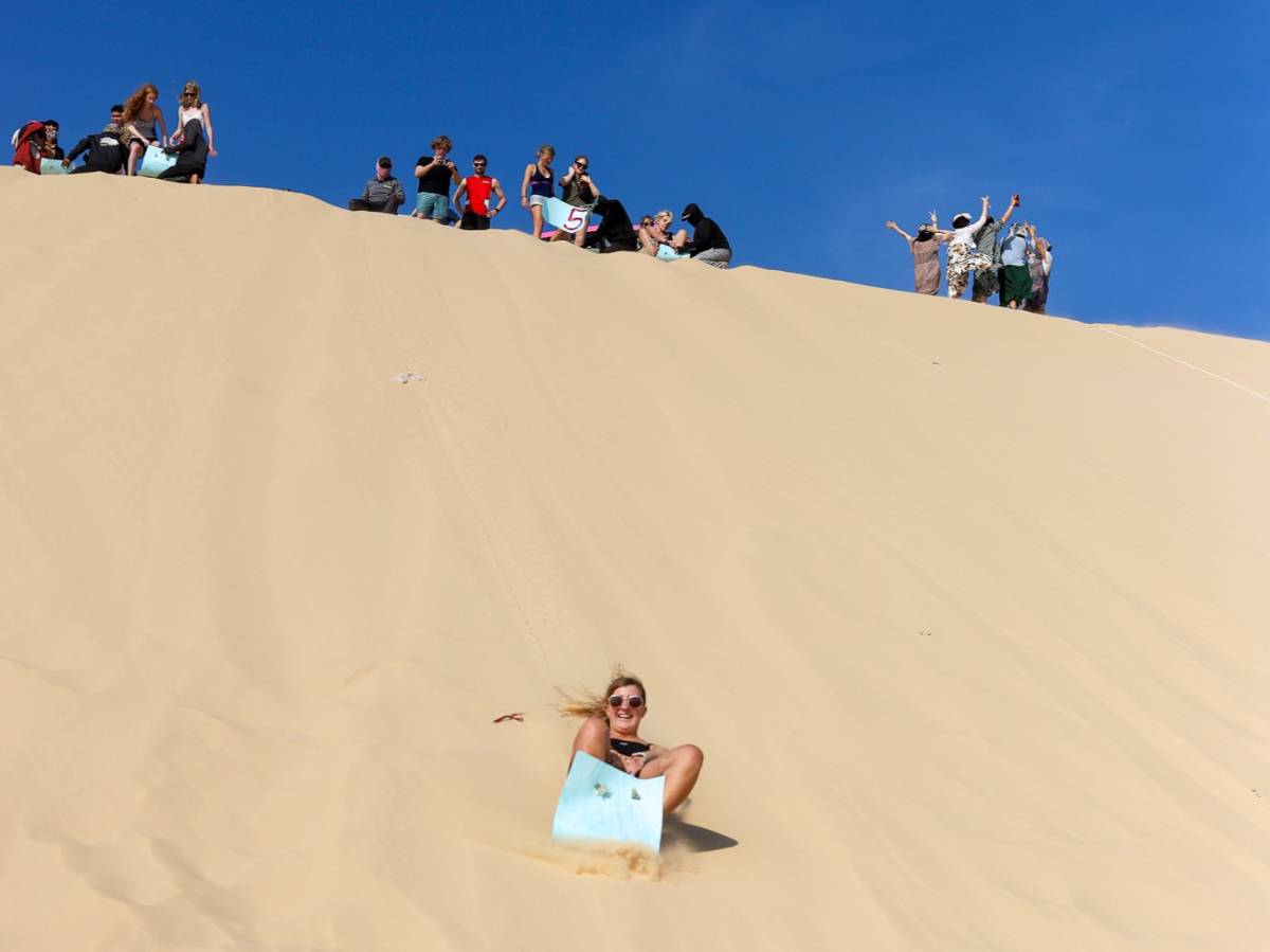 Of course we also have a ton of fun, like dune-sledding in Vietnam.
