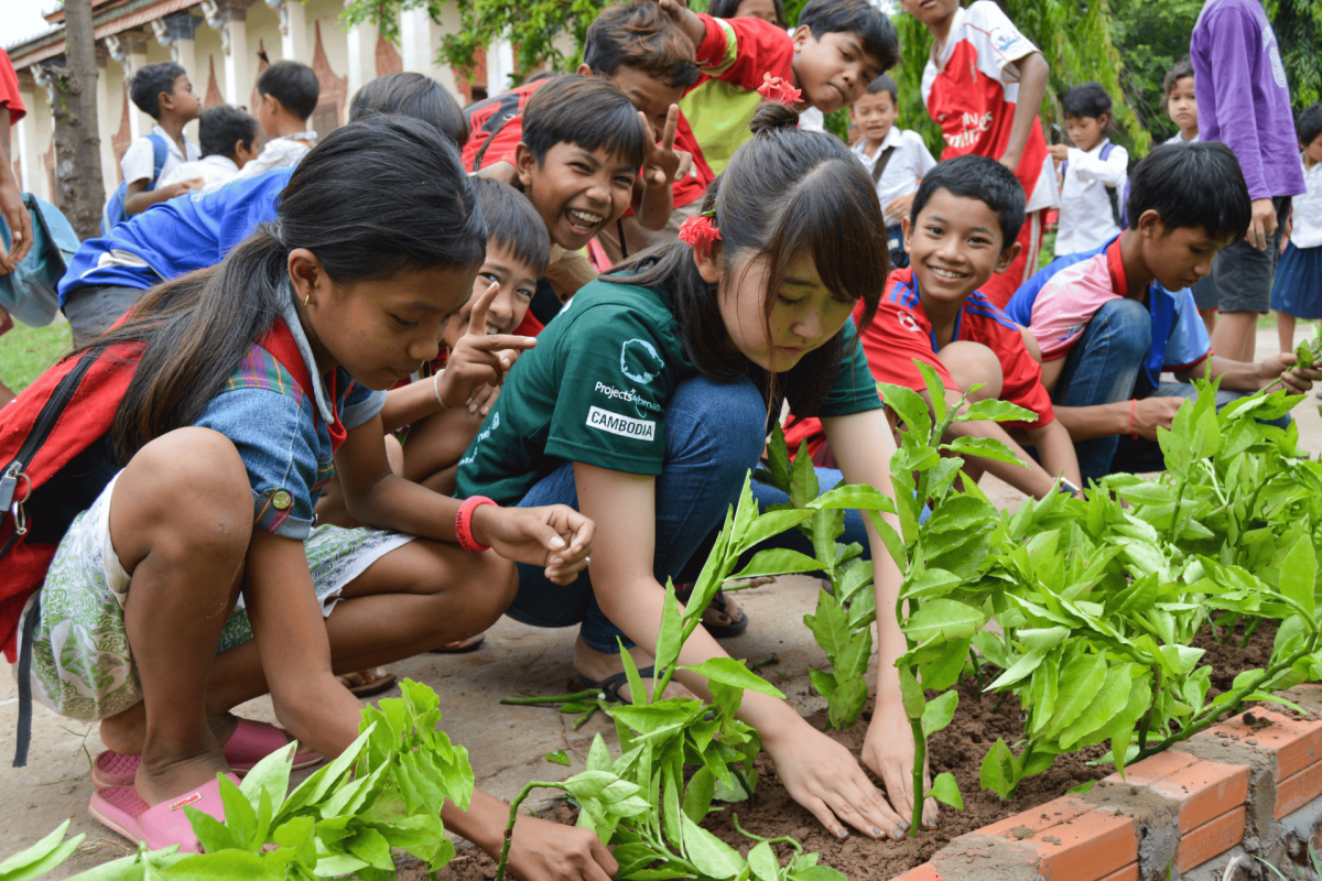Participant helps out at the local school on Silk Island