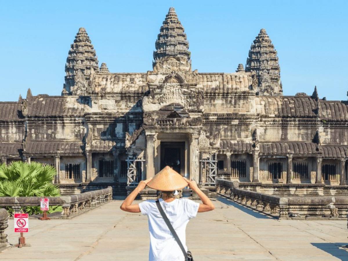 Participant walks towards Angkor Wat
