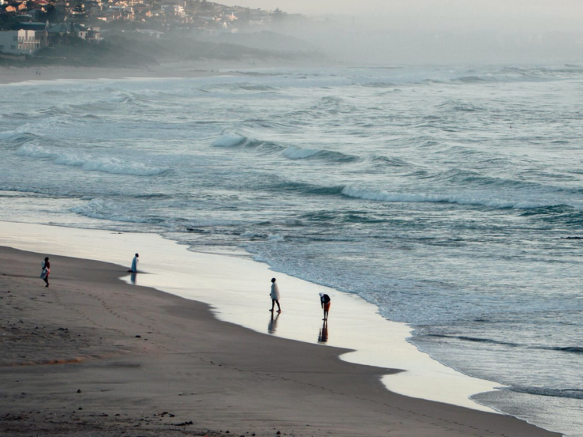 people at the shoreline