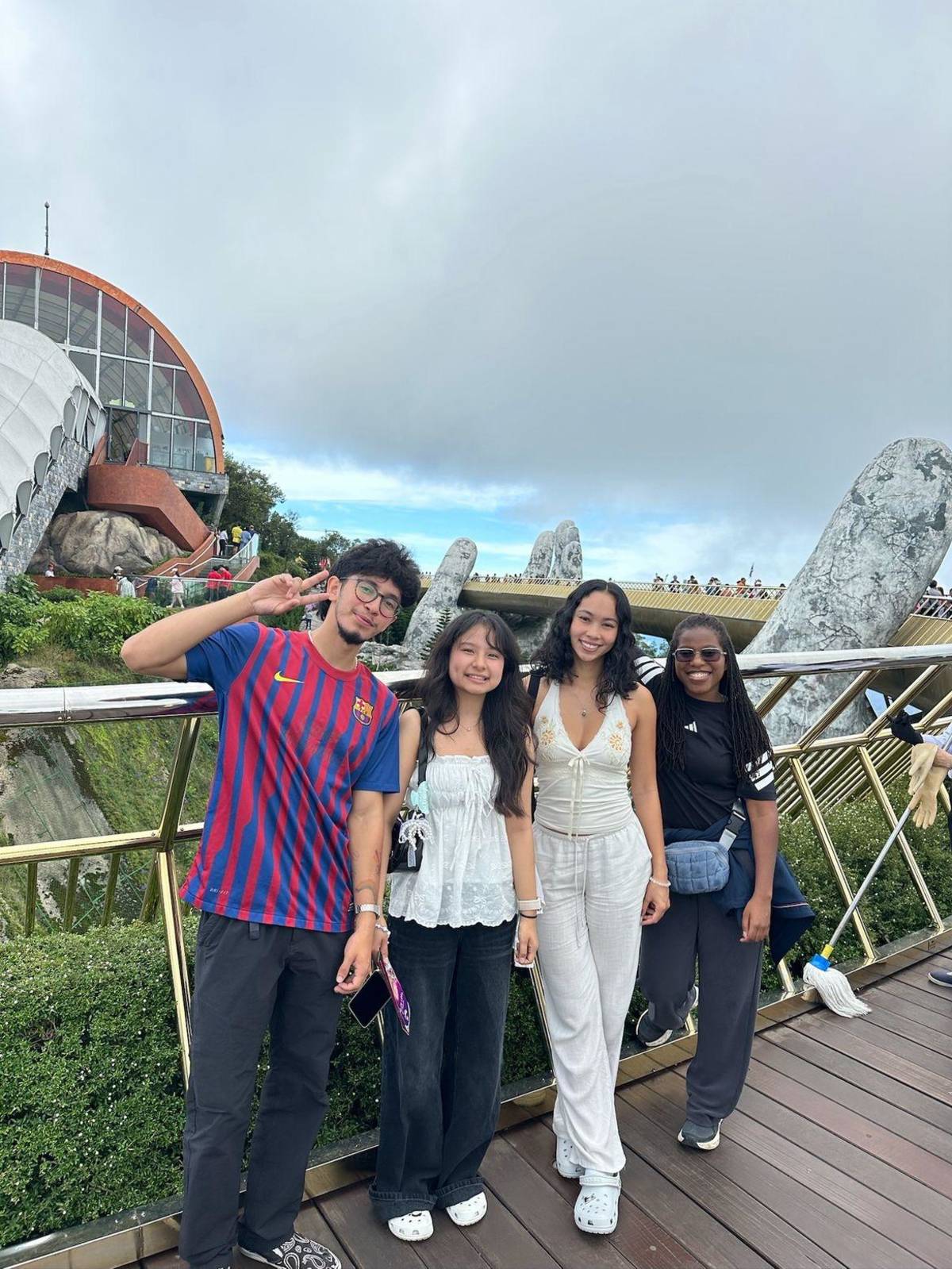 People in front of golden bridge