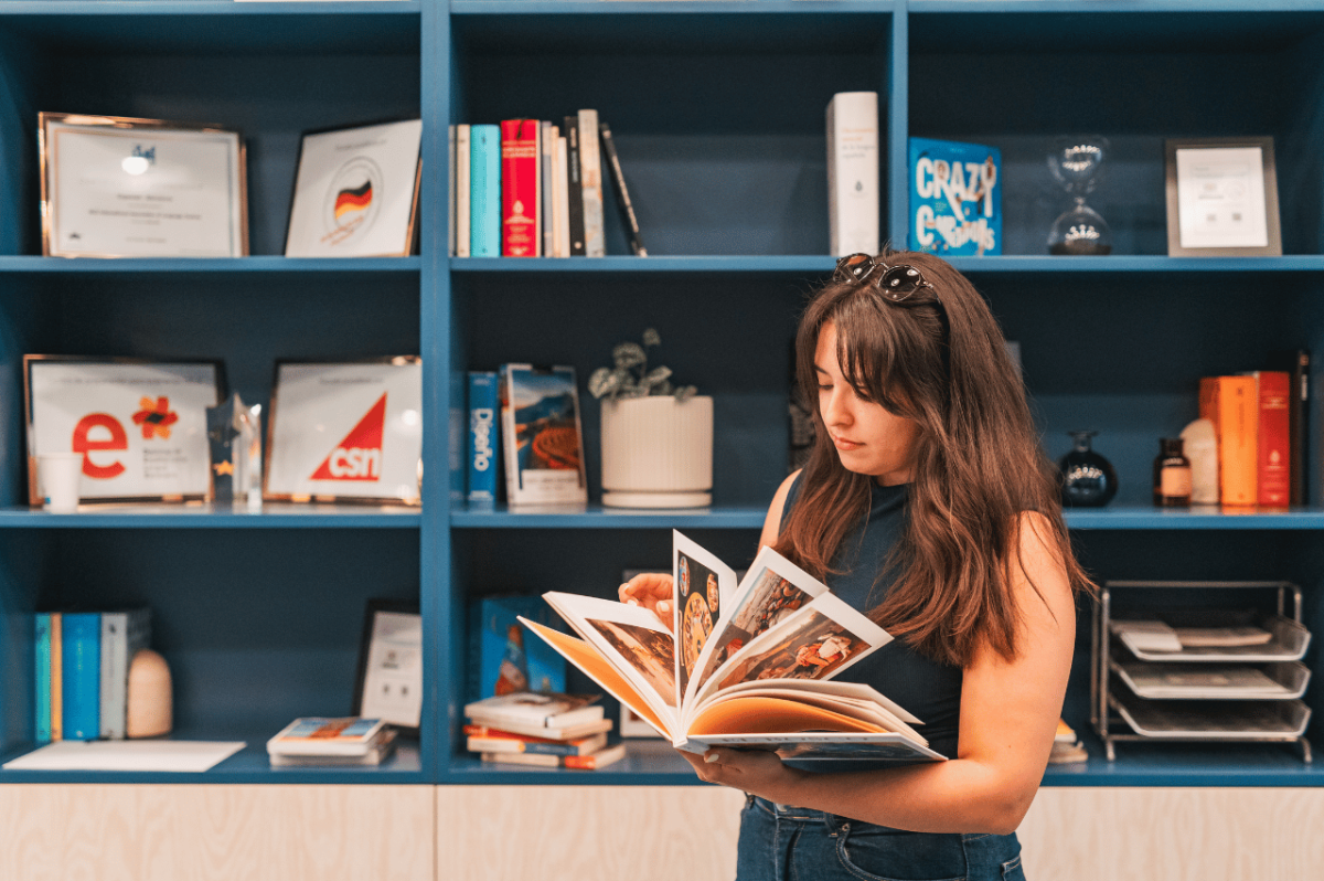 person looking at a book