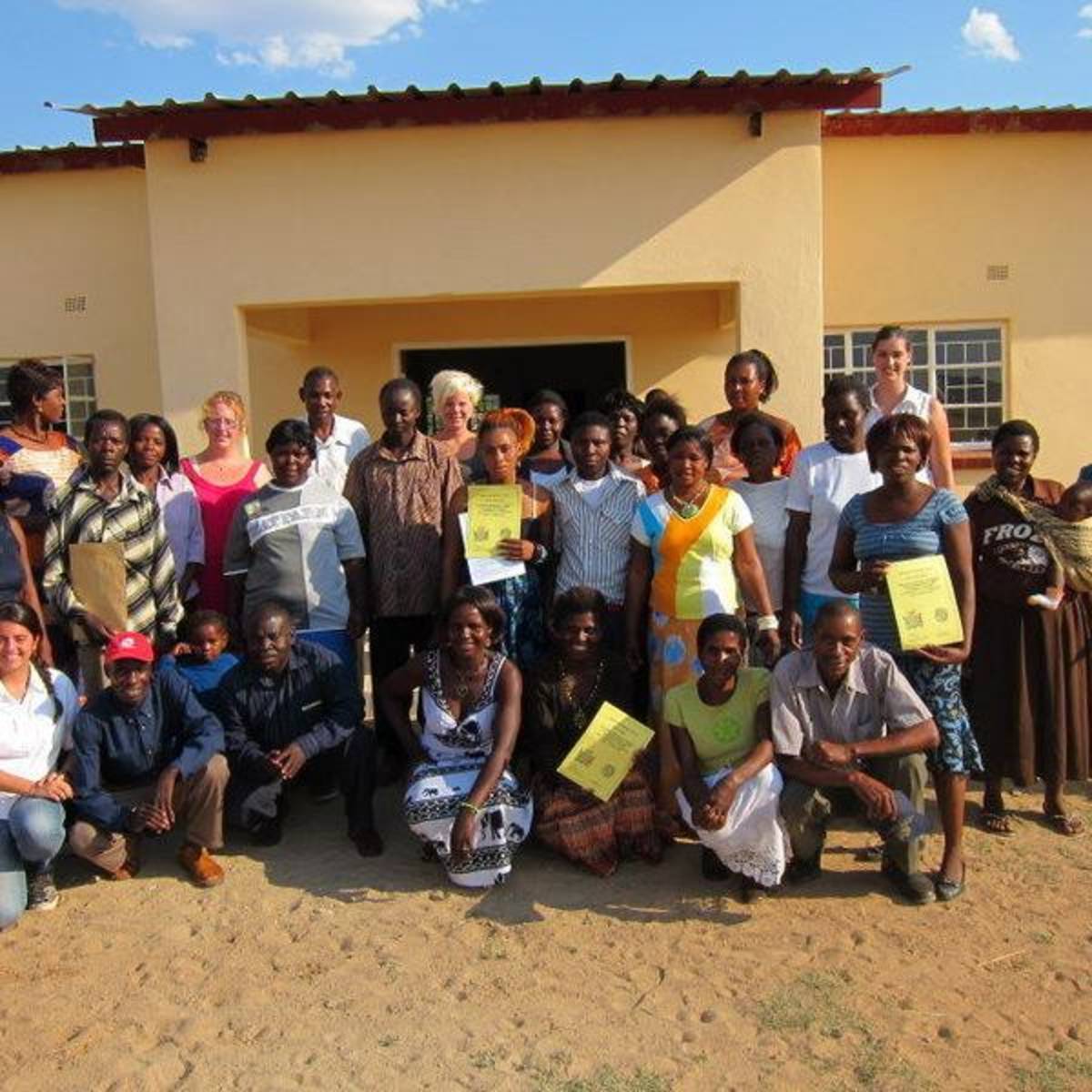 Group photo of staff + Group members