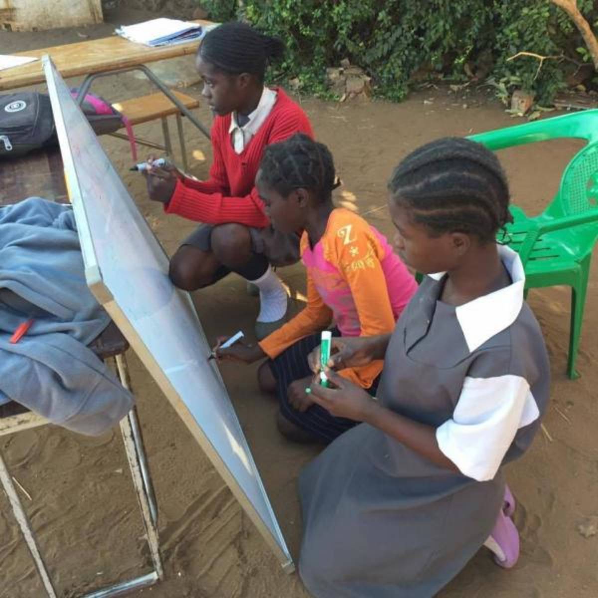 Girls engaging in a project lesson