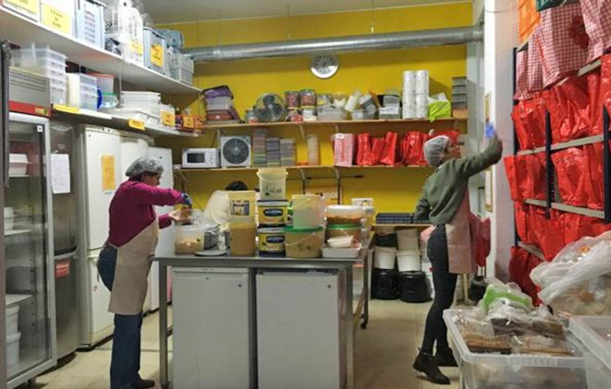 Two women working in a kitchen