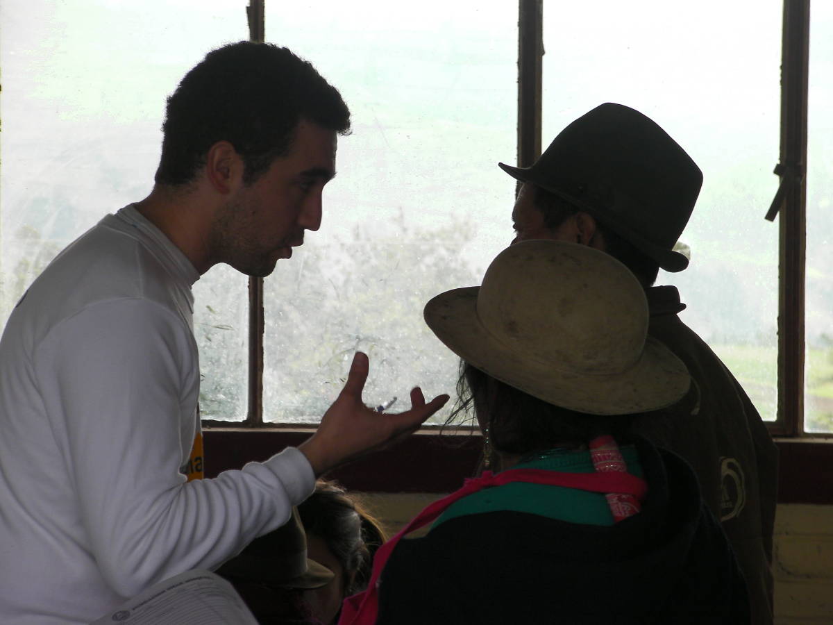 volunteer talking to locals