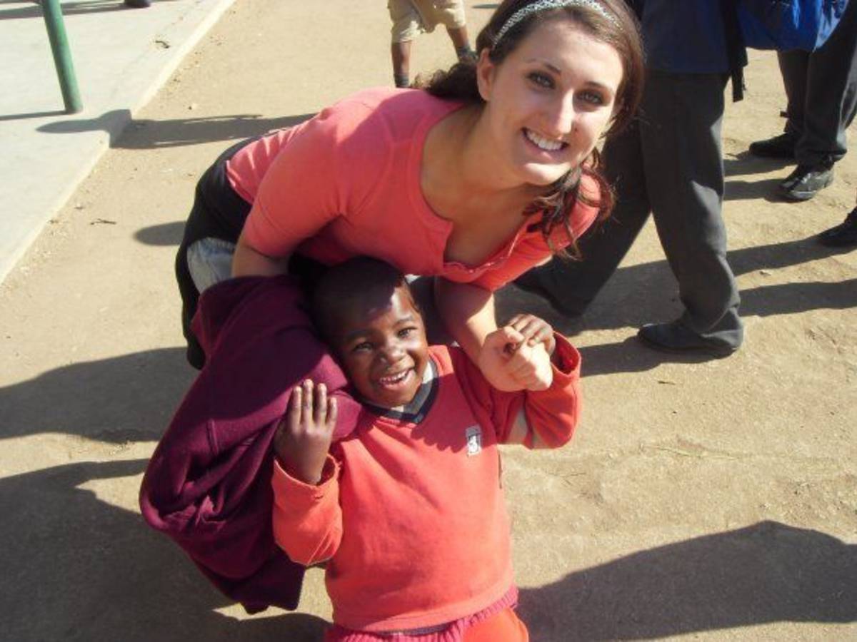 Volunteer and child