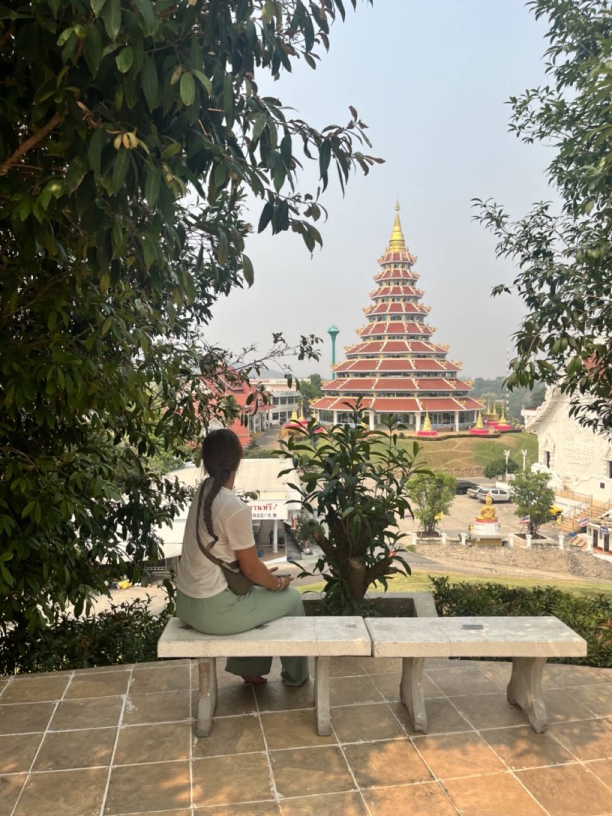 sitting and looking at a temple