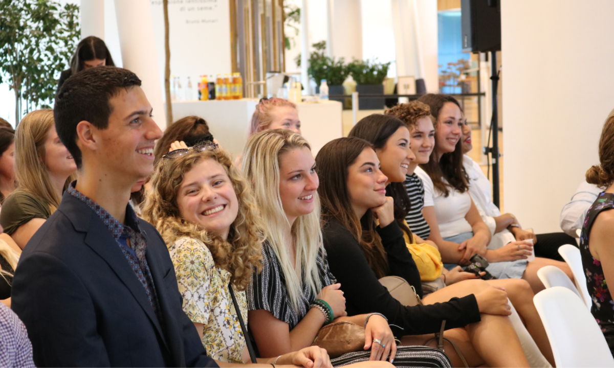 Smiling Students Engaged in a Study Abroad Class