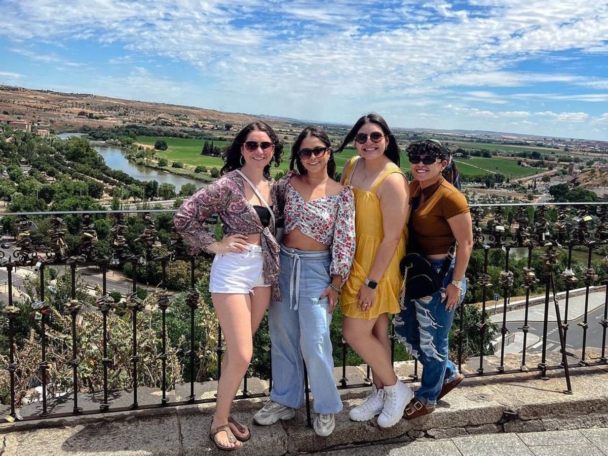 Some of our interns posing in front of a great view with some fields in the background in Madrid!
