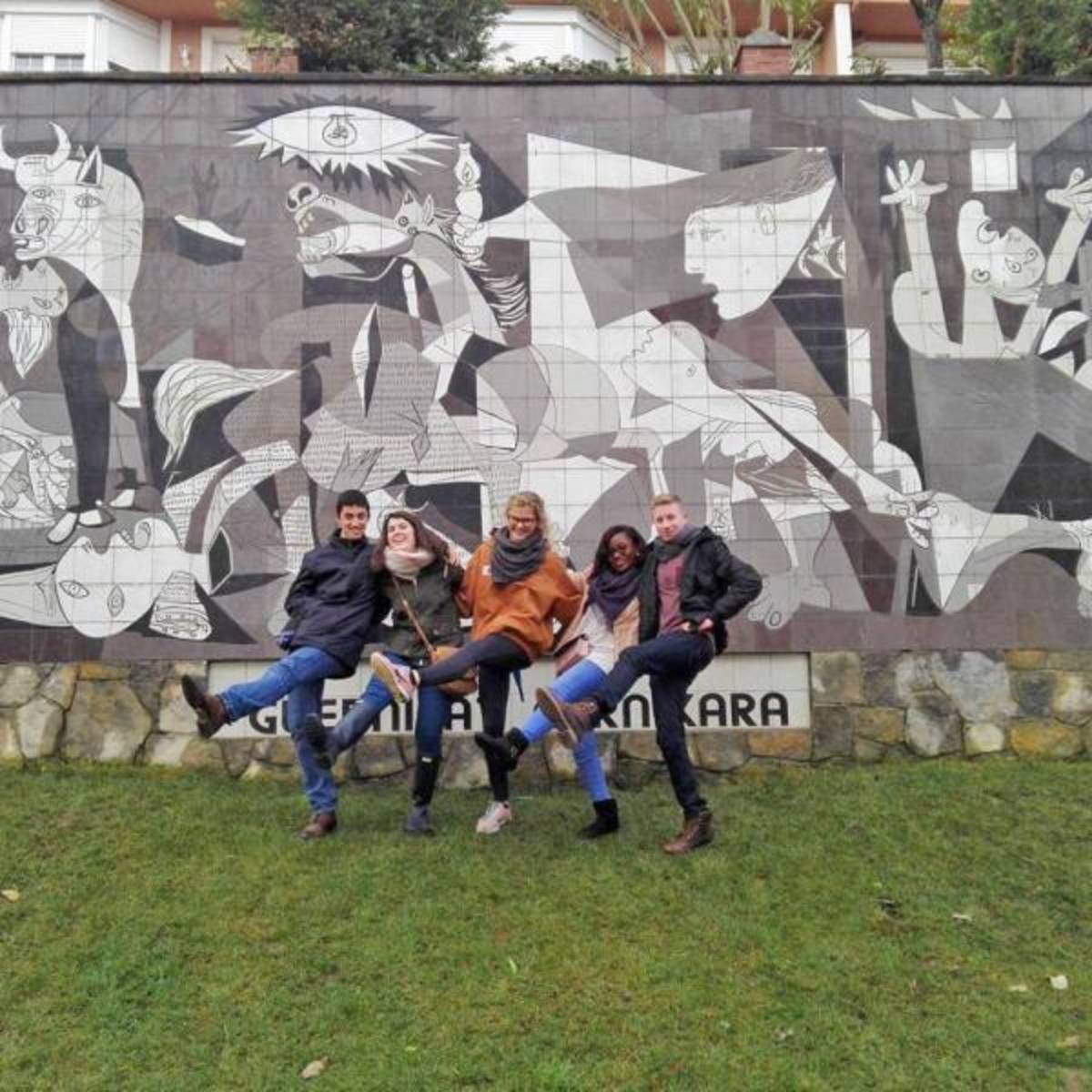 Students in front of mural 
