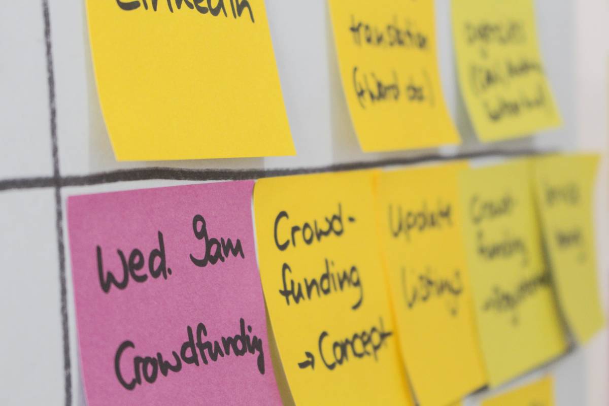 sticky notes on a white board