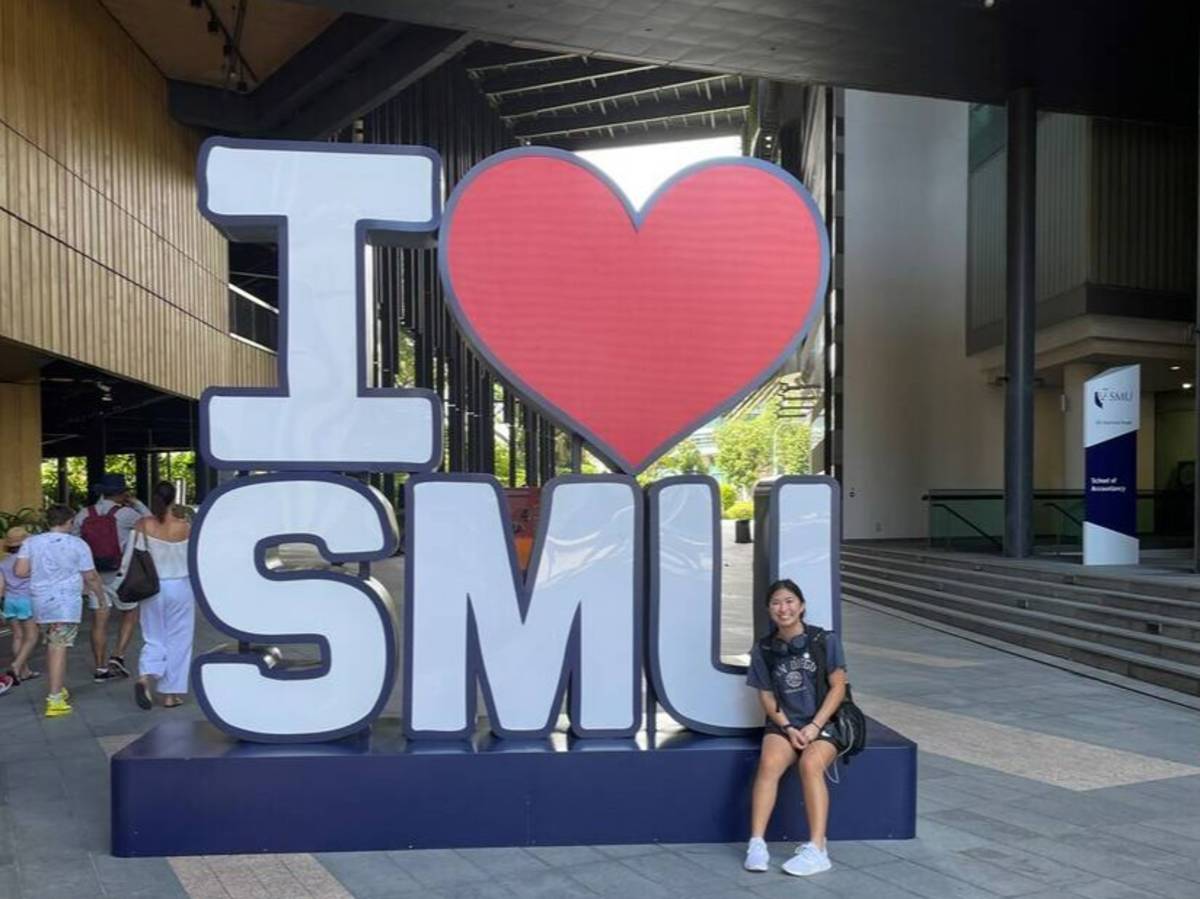 Student at SMU sign