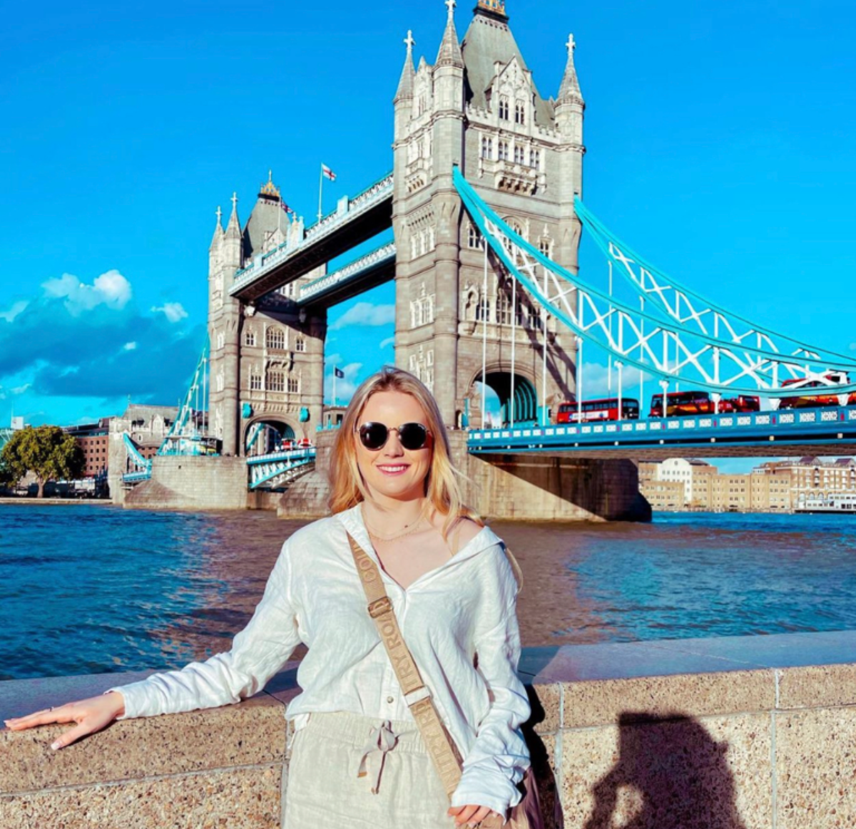Student in front of Tower Bridge. 