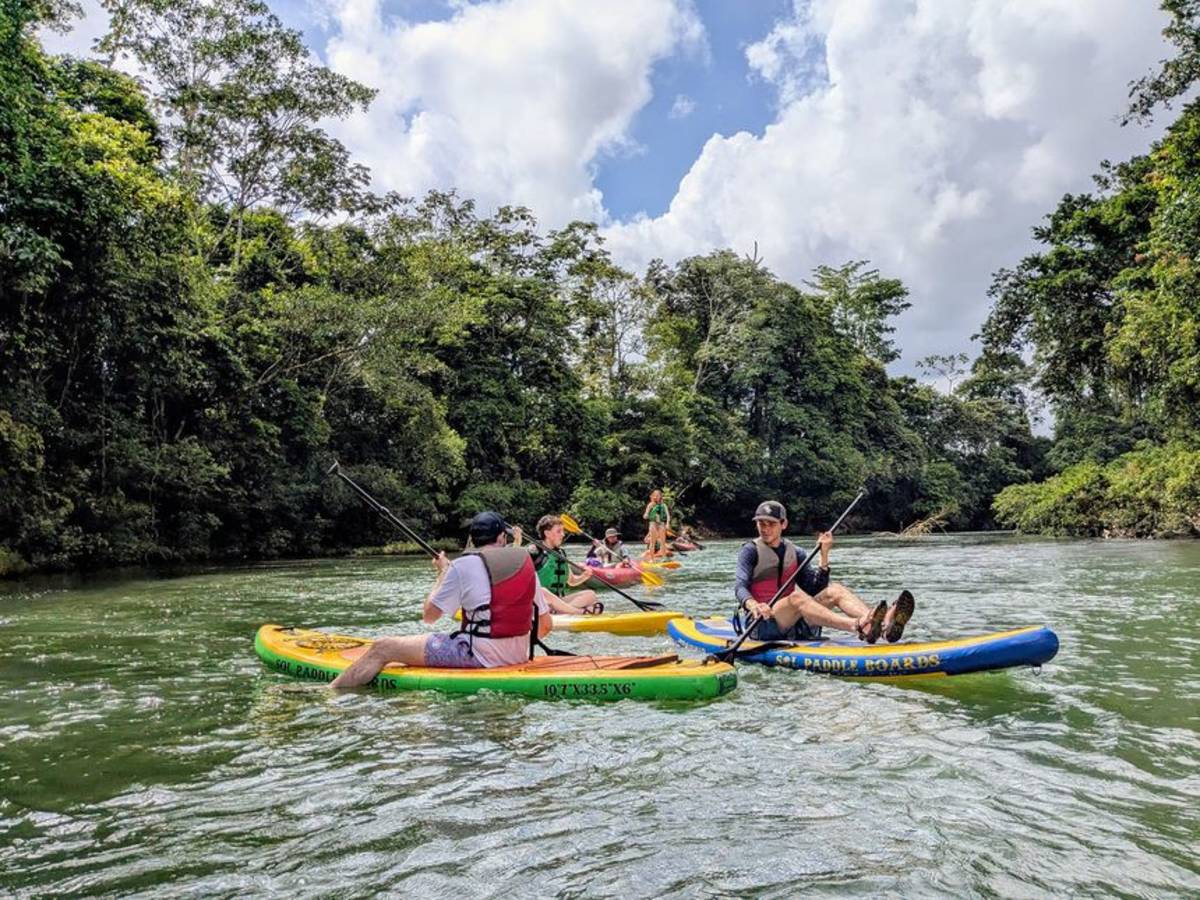 Student kayaking down river in Monteverde