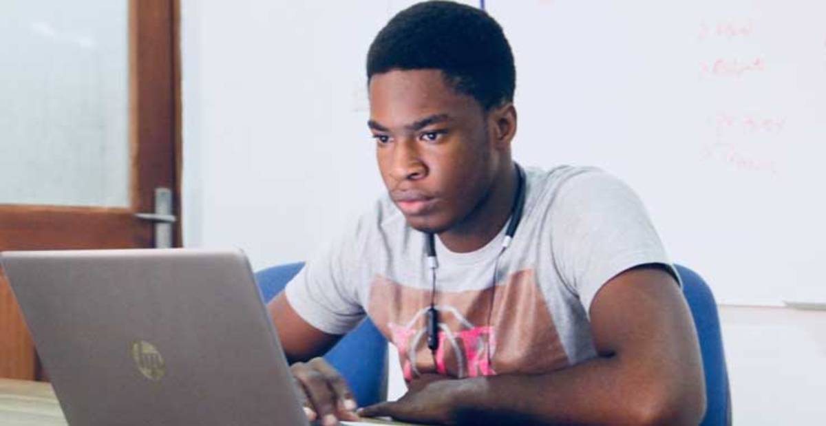 Student on a computer concentrating.