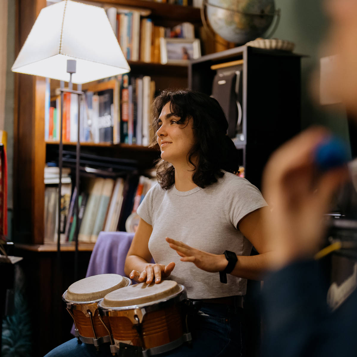 Student plays the drums. 