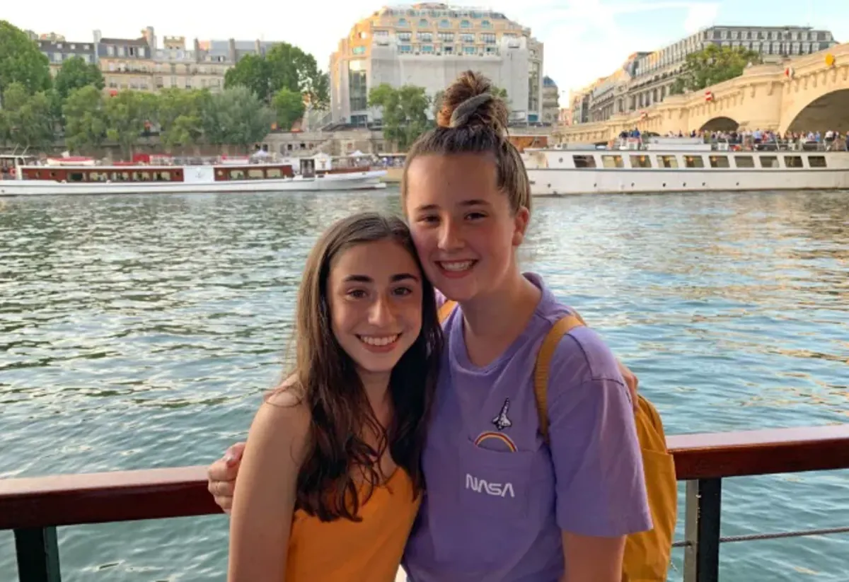 Student pose near the Seine
