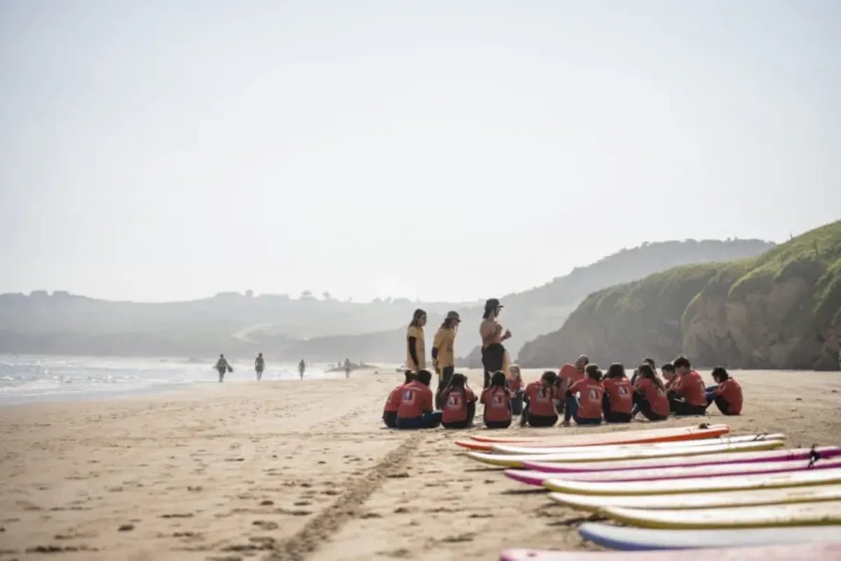Student sit on the beach