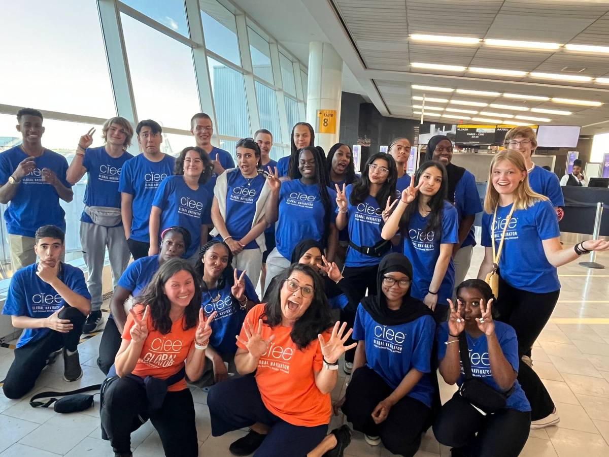 Students at the airport posing before studying abroad in Rabat