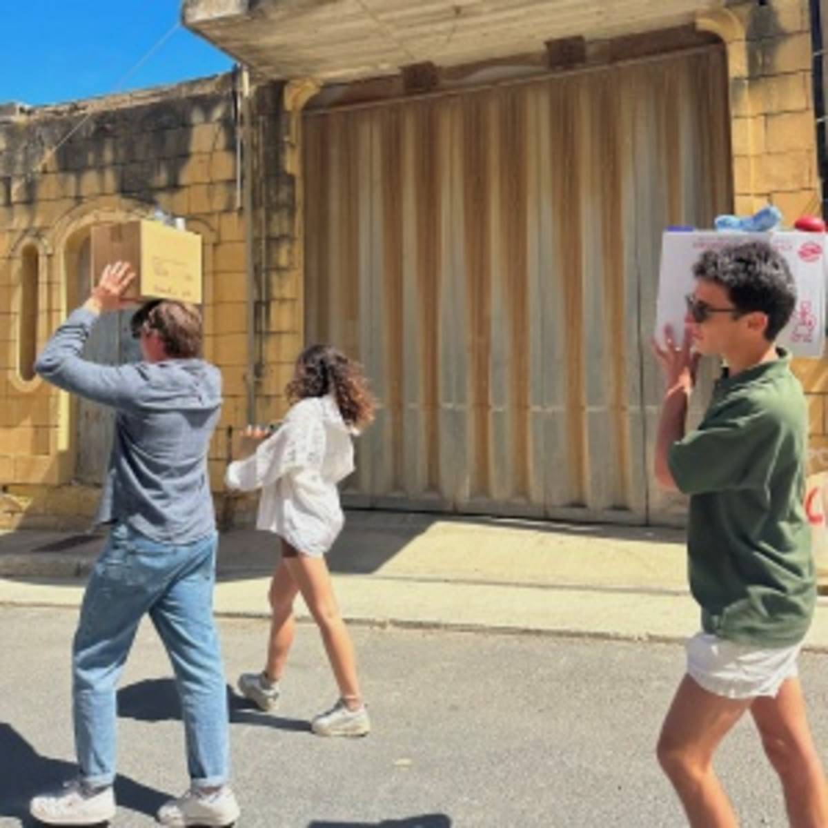 students carrying groceries in Rome