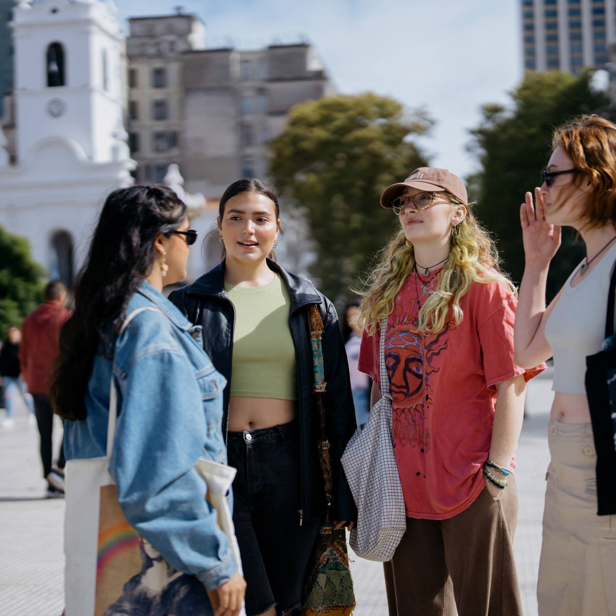Students chat outside. 