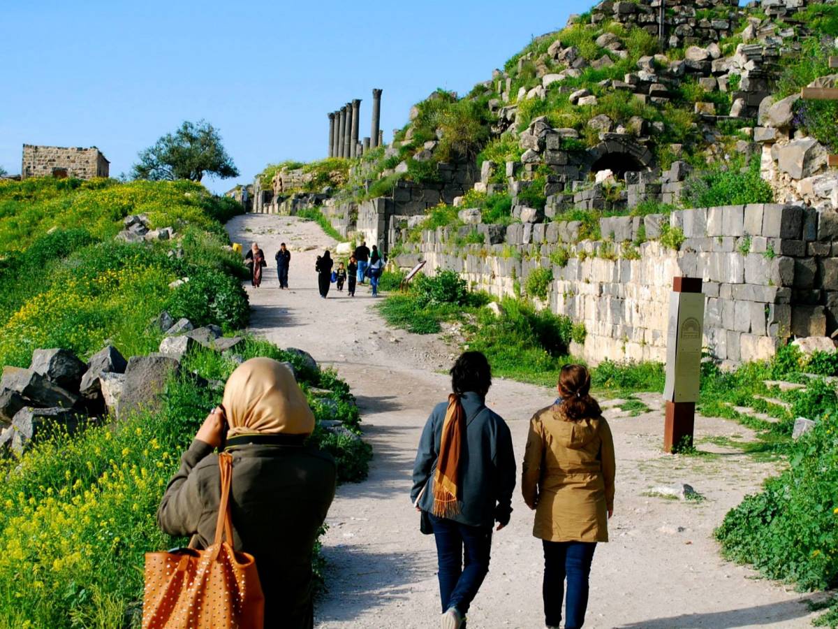 Students exploring temple ruins in Jordan