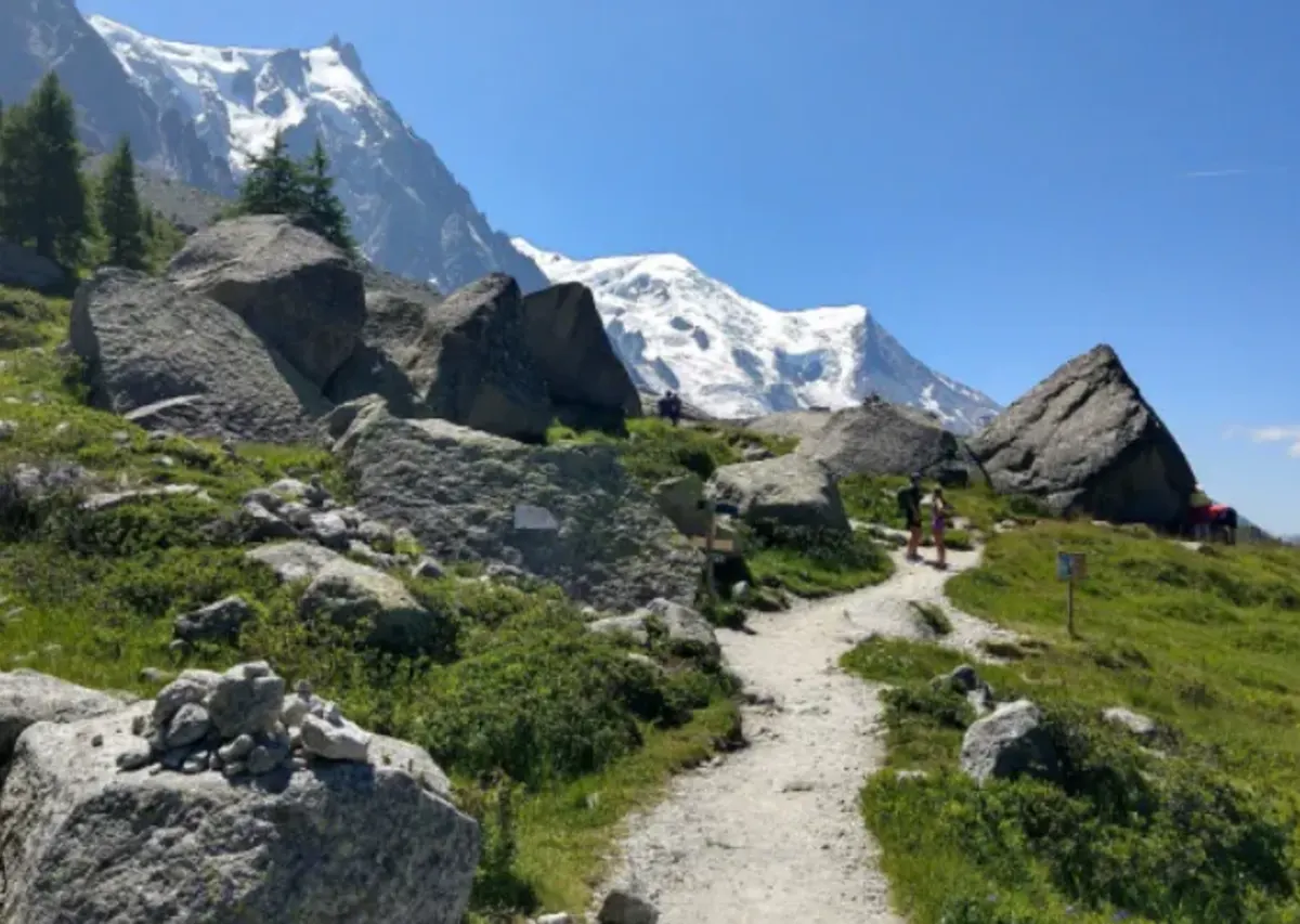 Students hike in the alps