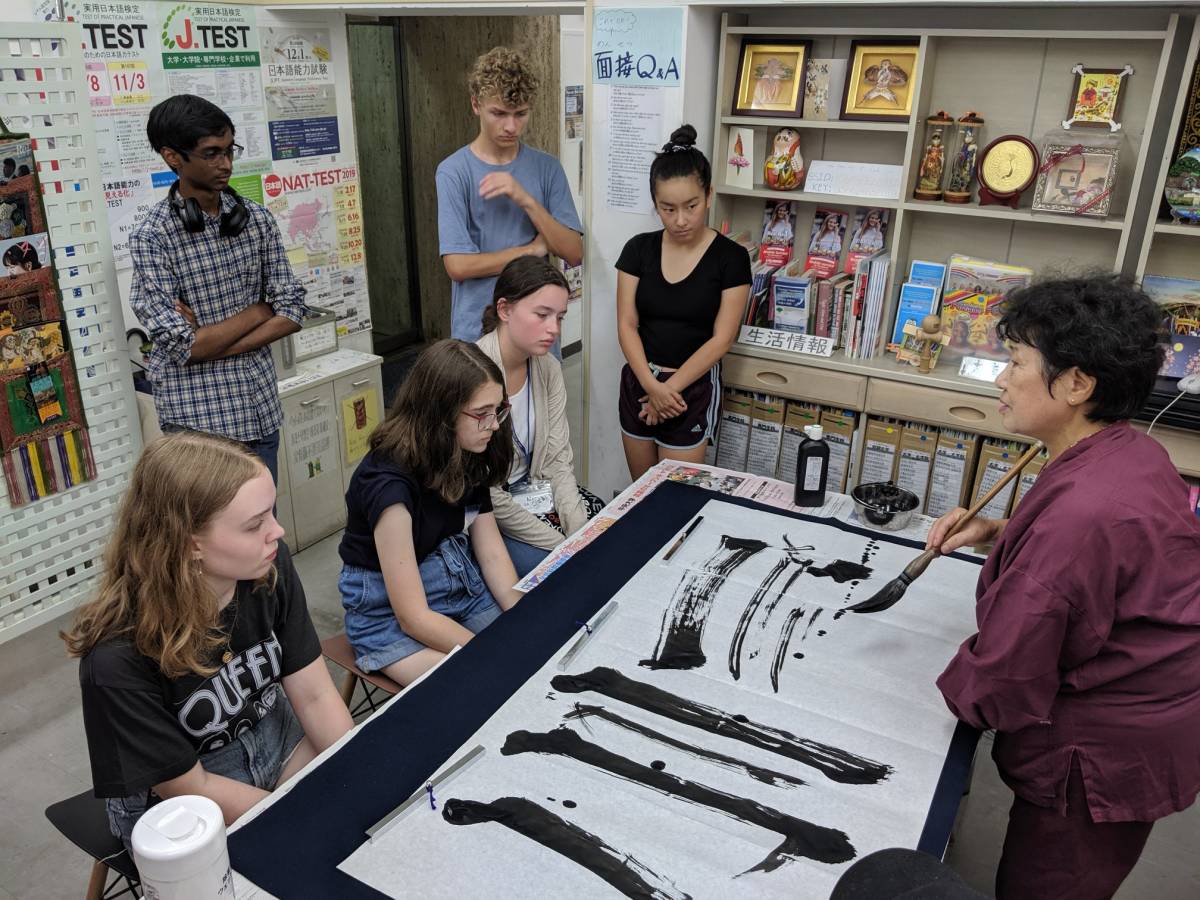 Students in calligraphy class