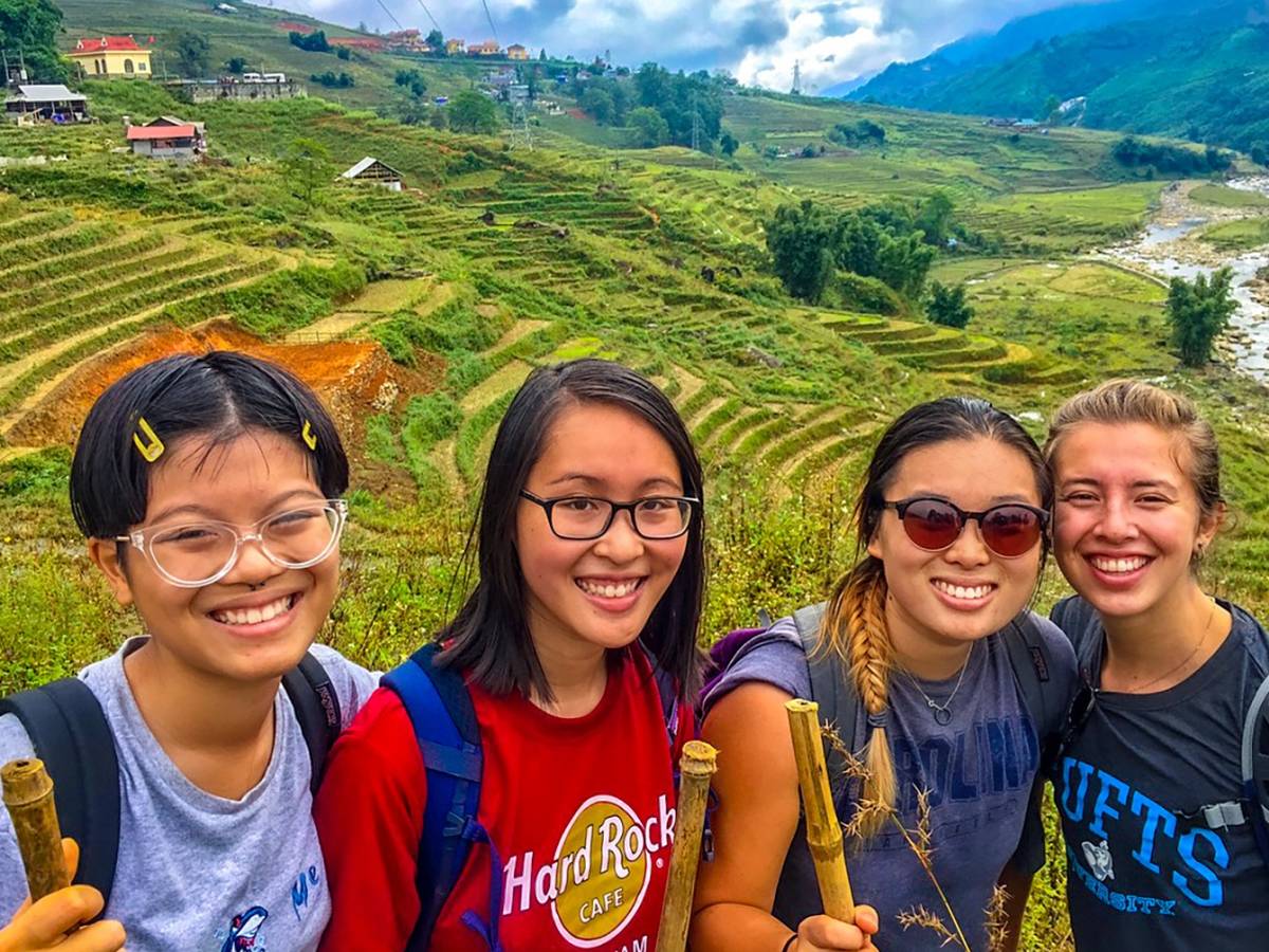 Students in front of rice fields in Vietnam