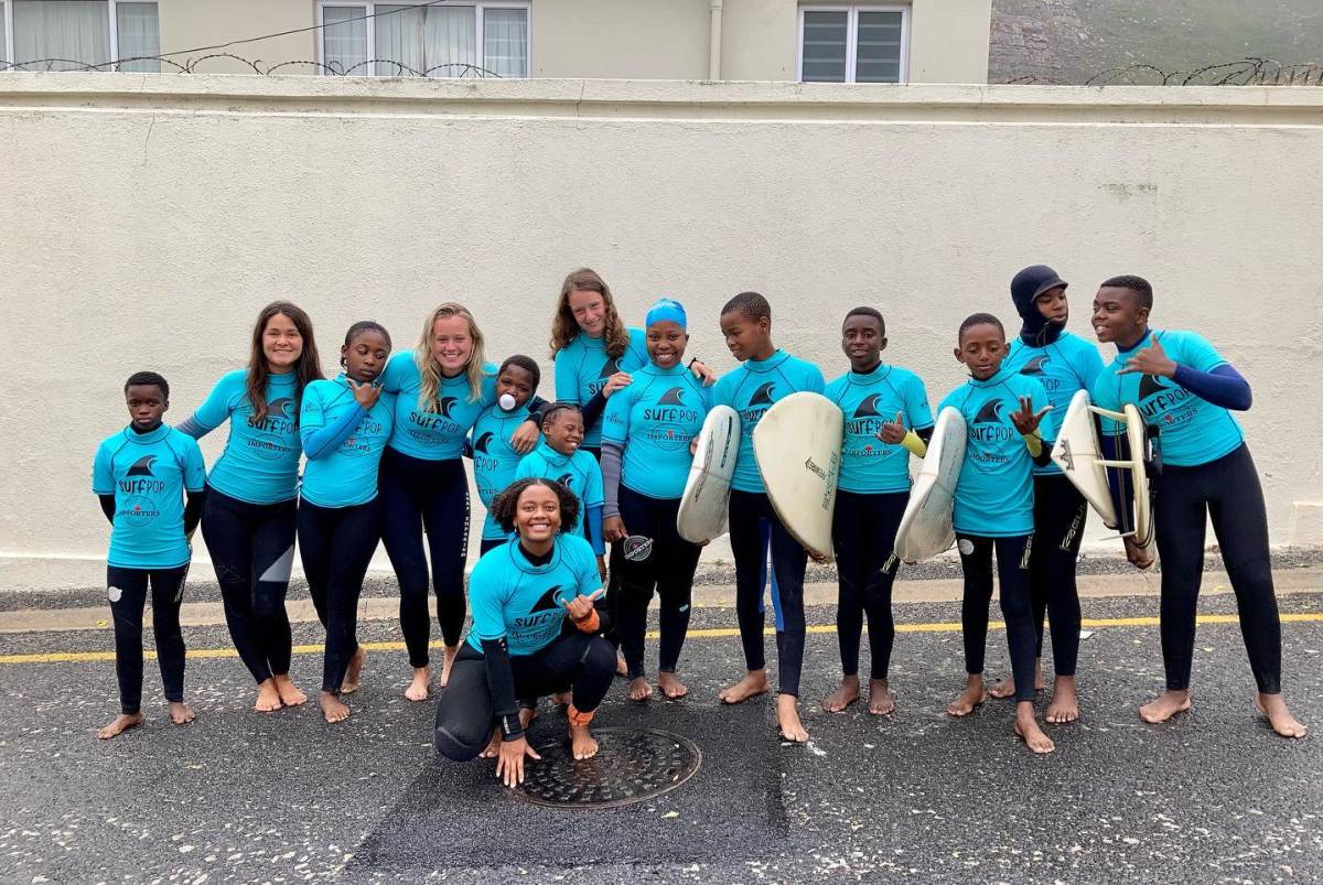 students learning to surf