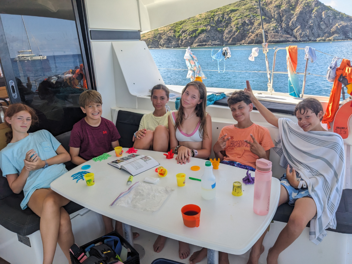 students on catamaran on Caribbean dive and sail trip