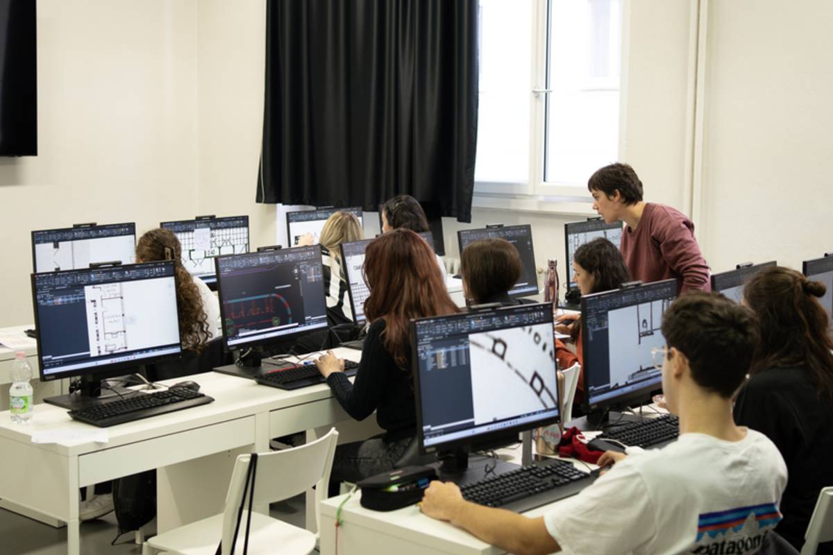 Students on computers in a classroom