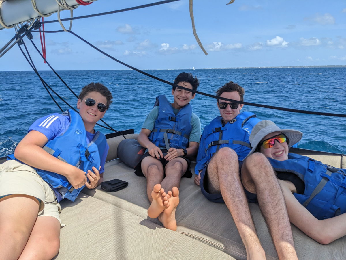 students on deck of catamaran on Caribbean dive and sail trip
