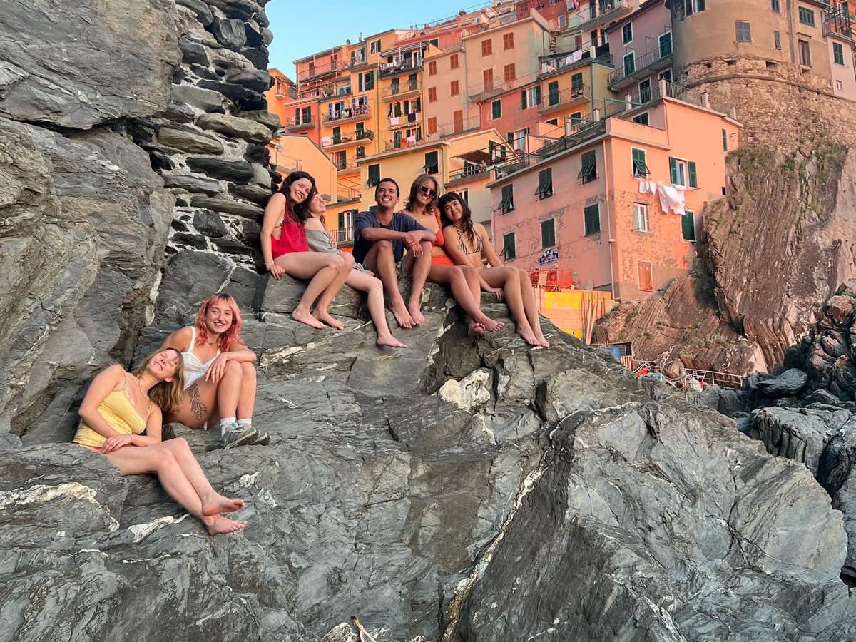 Students on Rocky Cliffside